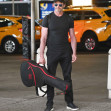 EXCLUSIVE: Hugh Jackman Shows Off His Muscles While Arriving to JFK Airport in New York City.