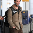 *EXCLUSIVE* A scruffy Keanu Reeves touches down at JFK!