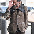 *EXCLUSIVE* A scruffy Keanu Reeves touches down at JFK!