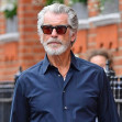 *EXCLUSIVE* The Silver Fox and a rather suave looking Pierce Brosnan looks cool in his sunglasses as the James Bond star is spotted out on a stroll in London's Chelsea.