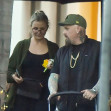 EXCLUSIVE: Cameron Diaz and husband Benji Madden share a sweet kiss as they leave a restaurant in Montecito Ca