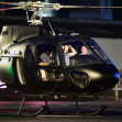 *EXCLUSIVE* WEB MUST CALL FOR PRICING  - Piloting a few friends on his chopper, The American All Action Hero Tom Cruise proves he has many strings to his bow by taking a few snaps of his guests as he arrived at the Battersea Heliport.