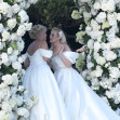 *PREMIUM-EXCLUSIVE* *MUST CALL FOR PRICING * Australian actress Rebel Wilson and her fashion designer fiancée Ramona Agruma look stunning in white wedding dresses as the couple are married in a beautiful ceremony at the Hotel Cala di Volpe in Sardinia