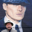 Peaky Blinders creator Steven Knight at the unveiling of a mural by artist Akse P19, of actor Cillian Murphy, as Peaky Blinders crime boss Tommy Shelby, in the historic Deritend area of Birmingham, ahead of the sixth and final series of the hit BBC One cr