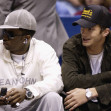 Sean "P. Diddy" Combs and Ashton Kutcher sit courtside