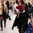 Monica Bellucci carries flowers while out in Paris