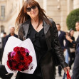 Monica Bellucci carries flowers while out in Paris