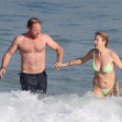 *PREMIUM-EXCLUSIVE* Kate Walsh hits the beach in a green bikini with husband Andrew Nixon