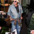 Johnny Depp steps out the Milan airport after the Rome film festival before a TV interview on channel 9