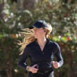 American actress Amber Heard is all smiles while out jogging in Madrid after announcing she is expecting her second child
