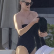 *PREMIUM-EXCLUSIVE* Charlize Theron, 49, looks amazing in one-piece swimsuit as she enjoys a beach vacation in Mexico with her mom and daughter