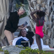 *PREMIUM-EXCLUSIVE* Charlize Theron, 49, looks amazing in one-piece swimsuit as she enjoys a beach vacation in Mexico with her mom and daughter