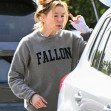 EXCLUSIVE: Renee Zellweger steps out with a messy head of hair after arriving home after doing a two week press tour around the world for her new movie