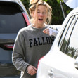 EXCLUSIVE: Renee Zellweger steps out with a messy head of hair after arriving home after doing a two week press tour around the world for her new movie