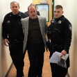 EXCLUSIVE: Michael Lohan is being arraigned after he attacked his wife or ex-wife yesterday