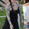 Mia Tyler relaxes on the beach in Miami