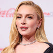 Lindsay Lohan wearing a Jacquemus Rita Long Dress arrives at the CinemaCon Big Screen Achievement Awards 2025