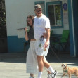Dan Reynolds and Minka Kelly take their dog for a walk in Los Angeles