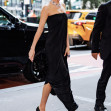 Dakota Johnson exudes elegance in a black Ferragamo dress at the Global Ambassadorship Celebration in NYC