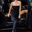 Dakota Johnson exudes elegance in a black Ferragamo dress at the Global Ambassadorship Celebration in NYC
