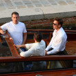 Newly single, Orlando Bloom arrives with Tom Brady to Jeff and Lauren's pre wedding dinner