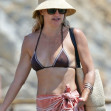 Kate Hudson, 46, flashes bikini body as she steps off yacht for lunch in Ibiza 4th of July getaway holiday