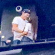 Ashton Kutcher and Mila Kunis at the Backstreet Boys concert