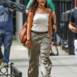 Suri Cruise visits mom Katie Holmes at work!
