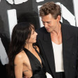 Zoe Kravitz and Austin Butler pose together for photographers at the premiere of "Caught Stealing" in London.