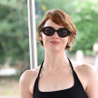 Emma Stone arrives at the 82nd Venice Film Festival