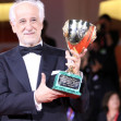 Europe, Italy, Lido di Venezia, September 06, 2025: Toni Servillo poses with the Coppa Volpi for Best Actor for the movie 'La Grazia' during the winners photocall at the 82nd Venice International Film Festival on September 06, 2025 in Venice, Italy.   Pho