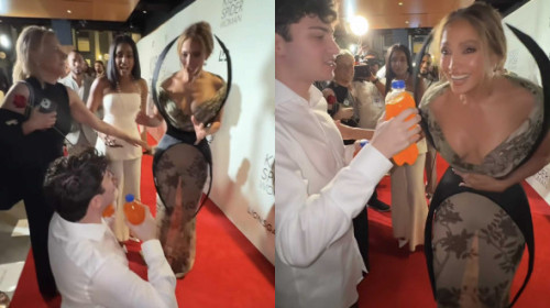 Reacția lui Jennifer Lopez când un fan a îngenuncheat în fața ei. Actrița pășea pe covorul roșu la premiera „Kiss of the Spider Woman”