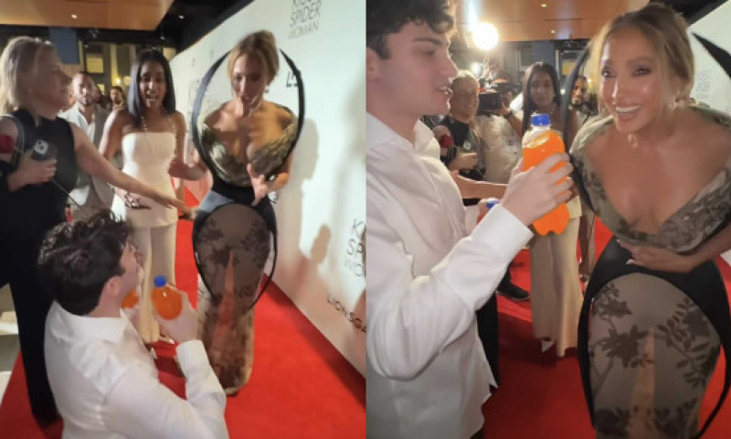 Reacția lui Jennifer Lopez când un fan a îngenuncheat în fața ei. Actrița pășea pe covorul roșu la premiera „Kiss of the Spider Woman”