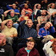 Fans with shaved heads sit in a cinema hall waiting for a free preview of Yorgos Lanthimos’s new film 'Bugonia', in California