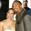 Dwayne "The Rock" Johnson and his wife, Dany Garcia Johnson at the premiere of  "Walking Tall"  in Hollywood, California on Monday March 29,  2004.  Photo credit: Francis Specker