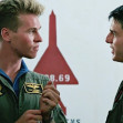 USA. Tom Cruise and Val Kilmer   in a scene from the ©Paramount Pictures cult movie: Top Gun (1986).Plot:  As students at the United States Navy's elite fighter weapons school compete to be best in the class, one daring young pilot learns a few things fr