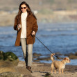 *EXCLUSIVE* Newly engaged Lily Collins and Charlie McDowell take their dog Redford for a walk on the beach