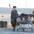 *EXCLUSIVE* Homeless Baywatch star Loni Willison pulls a cart full of belongings searching for something to eat at Santa Monica Beach