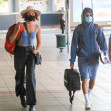 EXCLUSIVE: *NO DAILYMAIL ONLINE* Colour Coordinated Couple! Zac Efron And Vanessa Valladares Coordinate Their Blue Ensembles While Flying Back Into Sydney, Leaving Melbourne