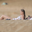 PREMIUM EXCLUSIVE: Captain Marvel star Brie Larson looks stunning in a butterfly one piece as she relaxes at the beach with Elijah Allan-Blitz while on vacation in Hawaii