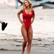 *PREMIUM-EXCLUSIVE* Lily James transforms into the sexy 90's Baywatch icon Pamela Anderson as she wears a tight red swimsuit and Pamela's trademark blonde hair on the set of the new series 'Pam and Tommy' out in Malibu.