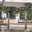 JLo is ethereal in white while Ben Affleck puffs on a cigarette as couple relax at lavish Miami Beach mansion.