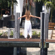 J-Lo puts her mind and body at ease with a stretch at the waterfront in Miami