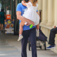 Bradley Cooper seen carrying his daughter as they take a stroll in NYC