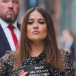 *EXCLUSIVE* Salma Hayek is seen eating popcorn as she leaves the premiere of The Hitman's Wife's Bodyguard.