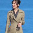 EXCLUSIVE: Dakota Johnson looks elegant in a taupe regency-style coat as she transforms into protagonist Anne Elliot while filming scenes for the Netflix adaptation of Persuasion in Dorset