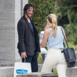 EXCLUSIVE: Keanu Reeves gives a production assistant a huge smile when he leave Das Stu hotel in Berlin-Tiergarten, Germany.