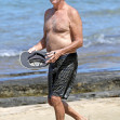 EXCLUSIVE: Pierce Brosnan takes off his shirt and takes a dip while in Hawaii