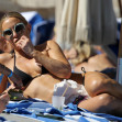 Kate Hudson looks amazing in a little black bikini as she hits the beach in Miami