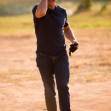 Tom Cruise greets fans after landing his helicopter in Hoedspruit, South Africa